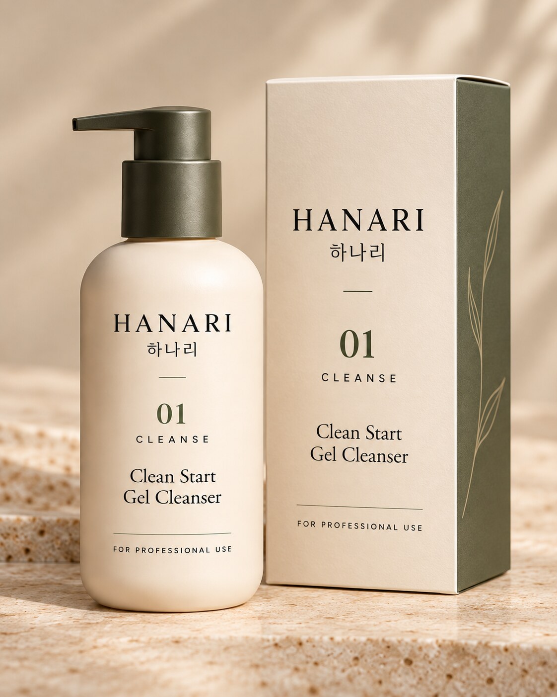 Concept render of the HANARI professional Clean Start Gel Cleanser pump bottle and its carton on a stone shelf.