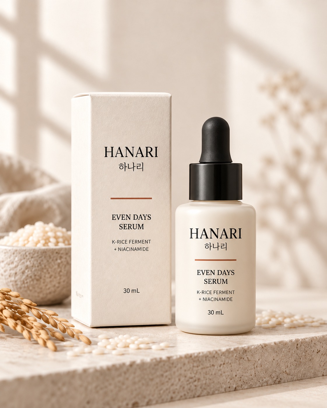 Concept render of the HANARI Even Days Serum dropper bottle and its carton beside rice stalks.
